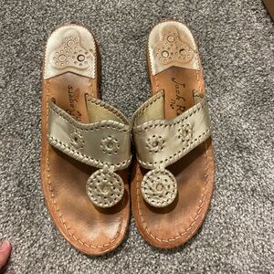 Gold Jack Roger flip flops!